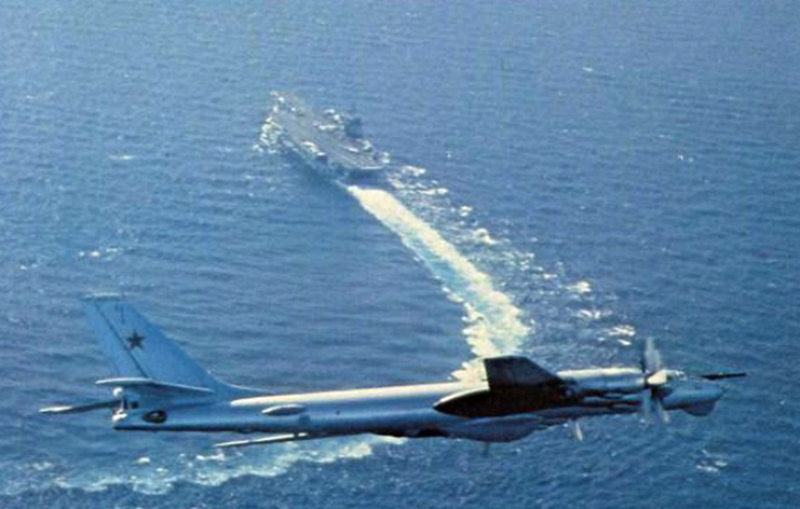 Illustration for article titled Cold War 2.0 As Russian Bears Buzz Carrier, Subs Snoop Around Seabed Cables
